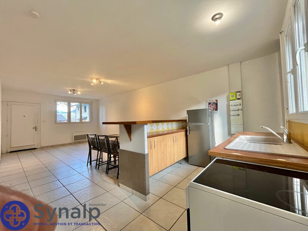 SCIONZIER – T2 de56.7 m2 en RDJ – 2parking – 1cave – Jardin privé