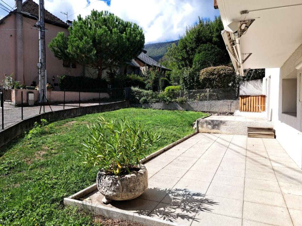 T3 avec jardin, cave et stationnement